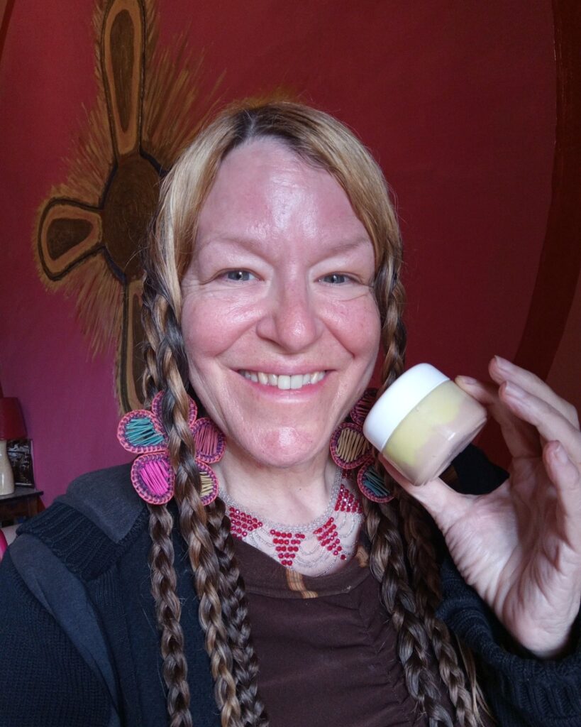 Dr. Mary Wingo holding botanical cream
